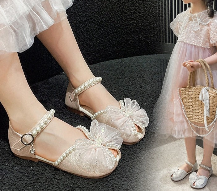 Sandalias con lazo de perlas