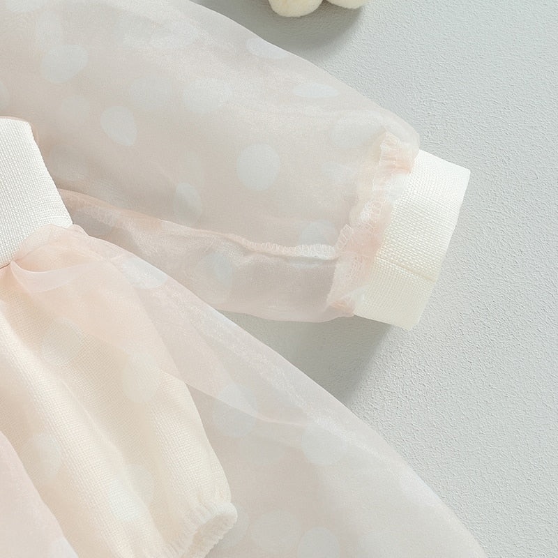 Mono de tul con falda de manga larga