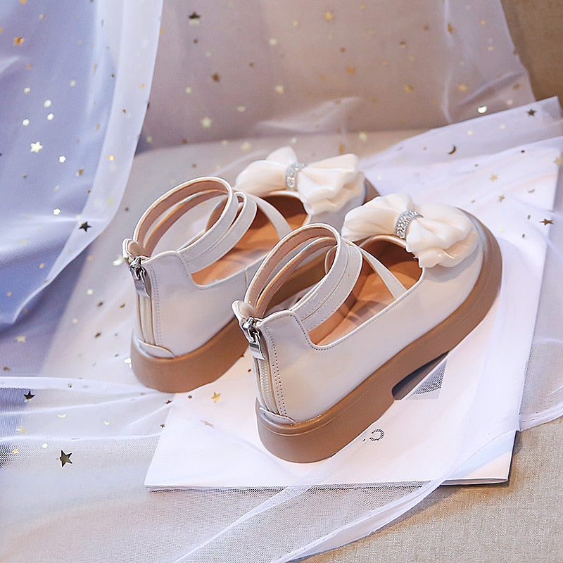 Sandalias con pajarita