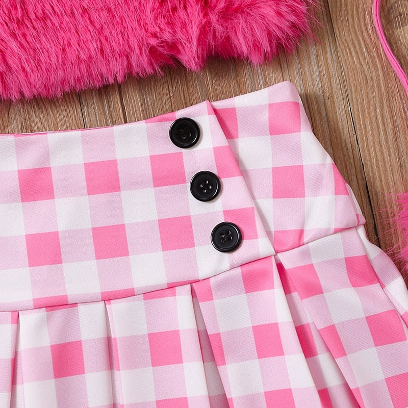 Conjunto infantil femenino de felpa y falda de ajedrez.