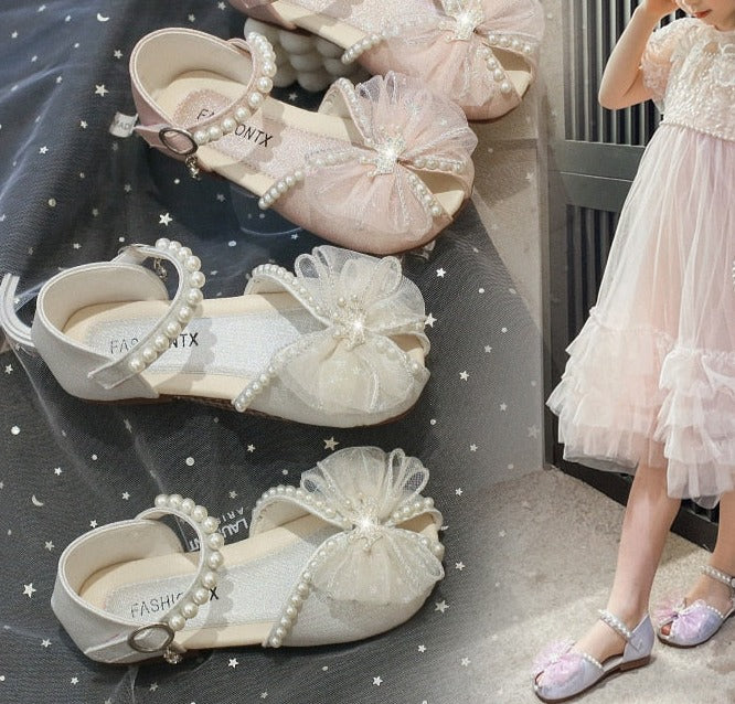 Sandalias con lazo de perlas