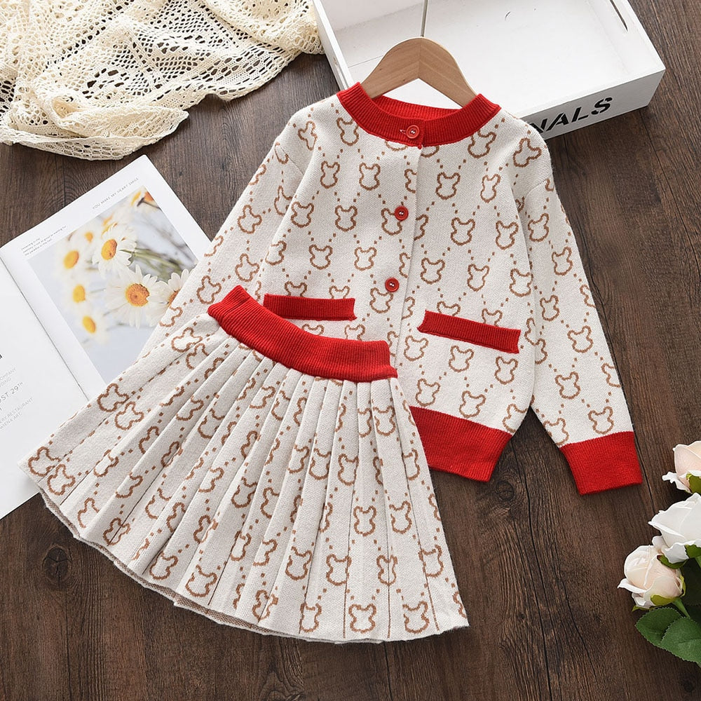 Conjunto infantil en falda plisada de lana