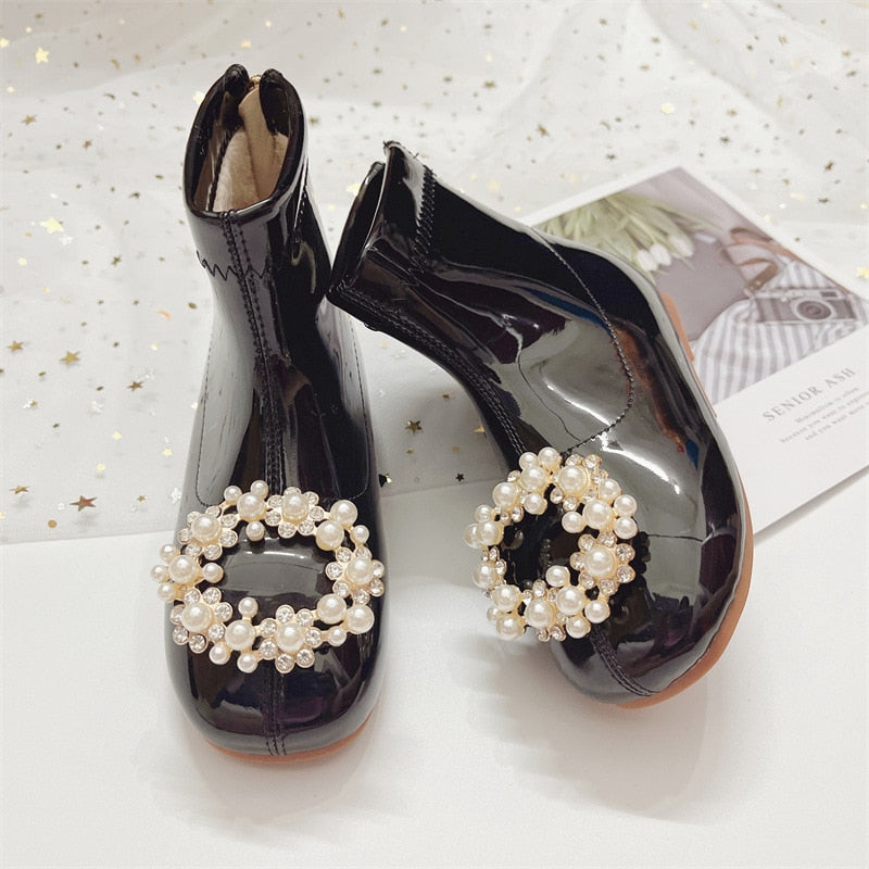 Botas de barniz perlado