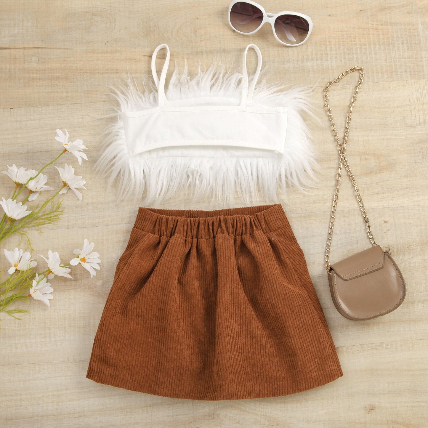 Conjunto camisola sin mangas de plumas + falda de pana acampanada con botones de cintura alta