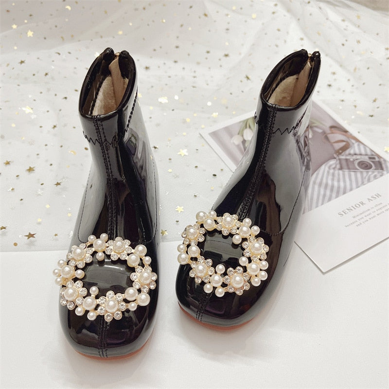 Botas de barniz perlado