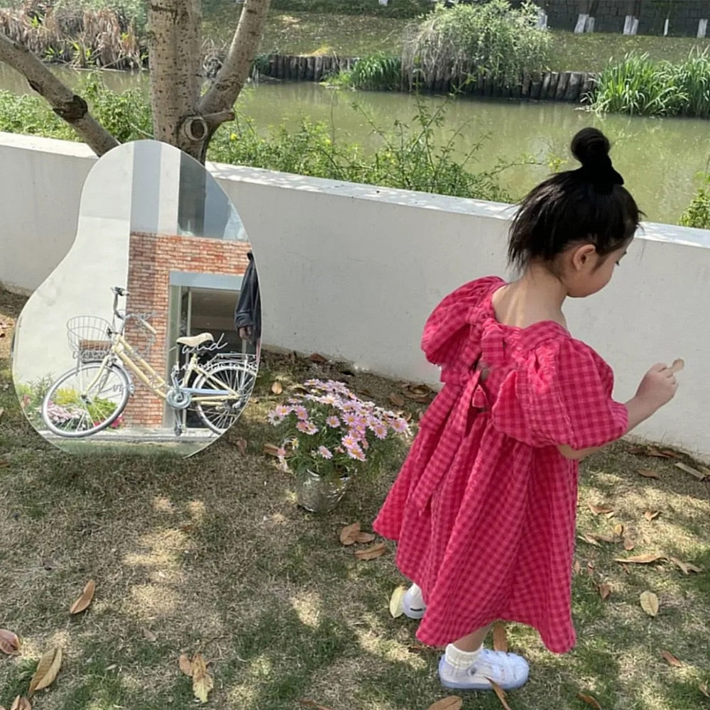 Vestido elegante con lazo