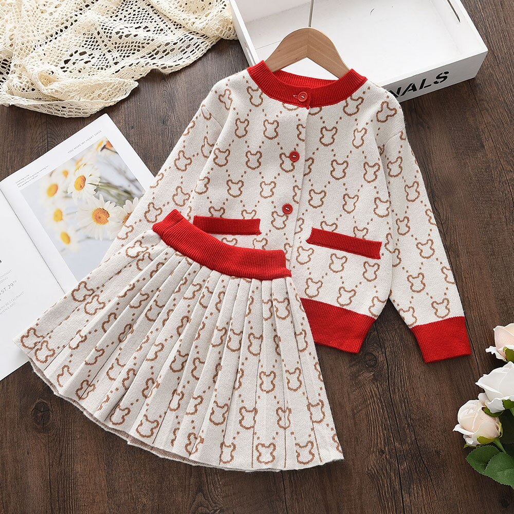 Conjunto infantil en falda plisada de lana