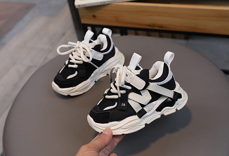 Zapatillas suaves con cordones para niños