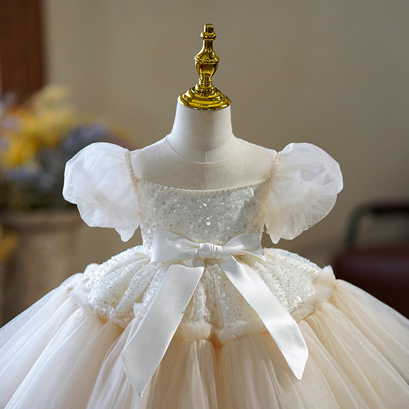 Vestido infantil con lazo brillante