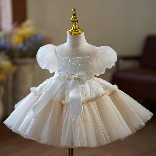 Vestido infantil con lazo brillante