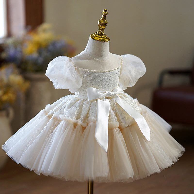 Vestido infantil con lazo brillante