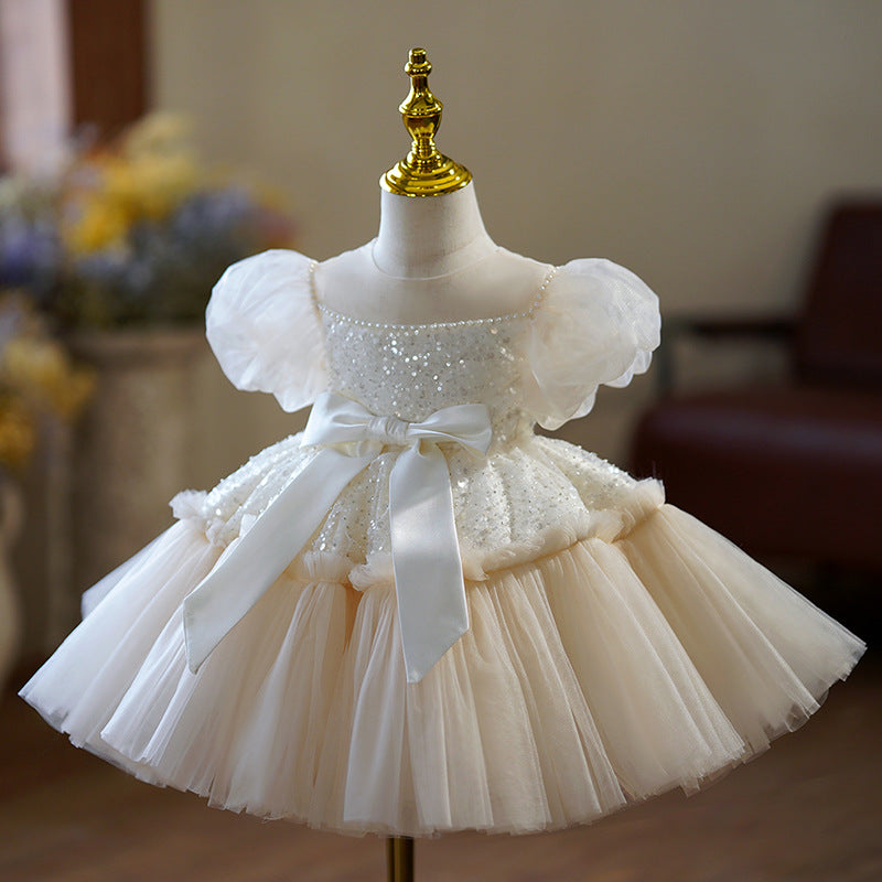 Vestido infantil con lazo brillante