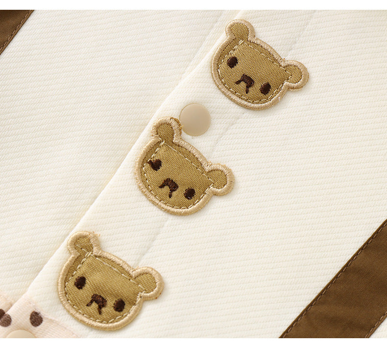 Mono infantil con cuello de osito de peluche