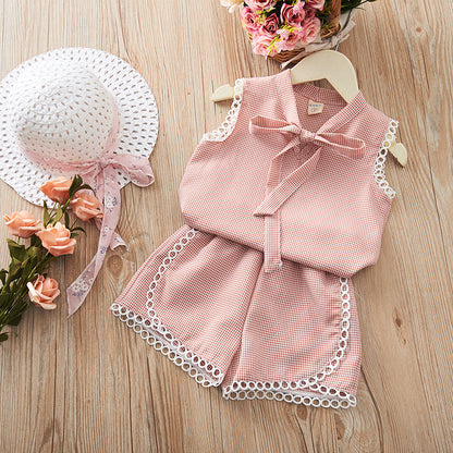 Conjunto infantil de verano con lazo.