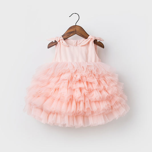 Vestido infantil rosa con capas de tul