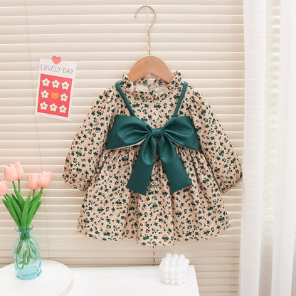 Vestido infantil con flores y lazo