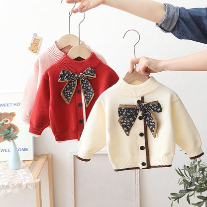 Cárdigan de punto con lazo para niño