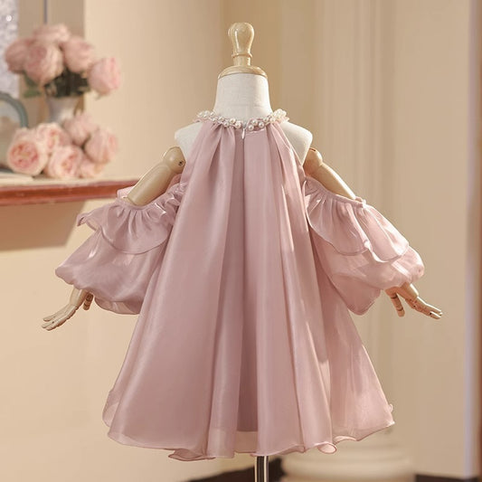 Vestido infantil abullonado con perlas