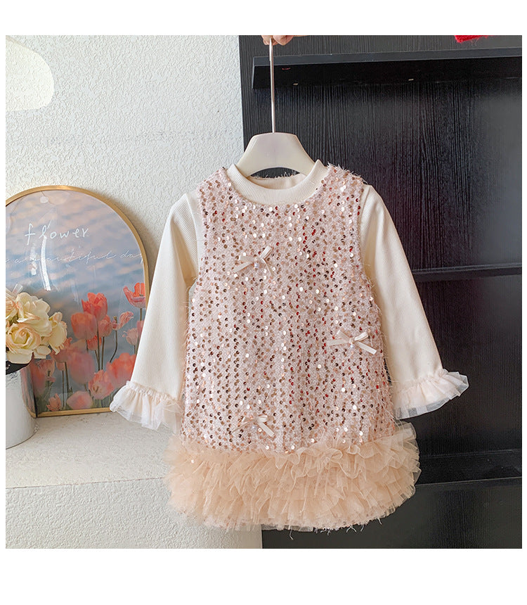 Vestido infantil brillante con lazos