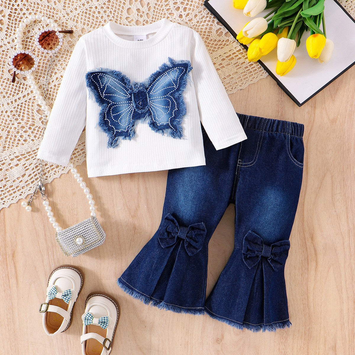 Conjunto de mariposa y vaqueros para niña