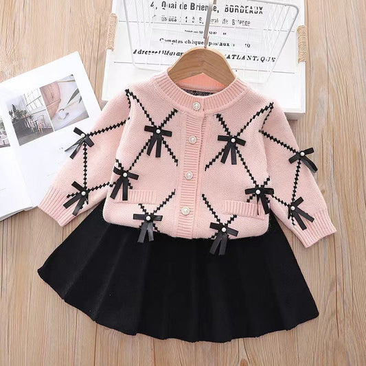 Conjunto de punto para niñas con lazos