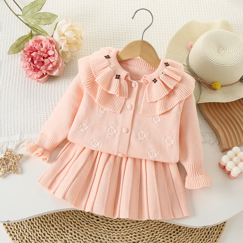 Conjunto de punto con flores para niña