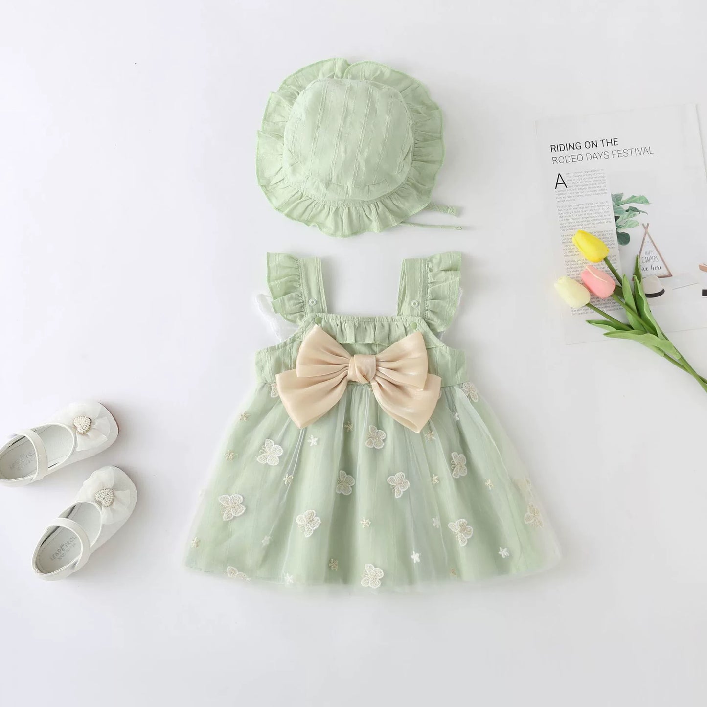 Vestido infantil con mariposas y lazo