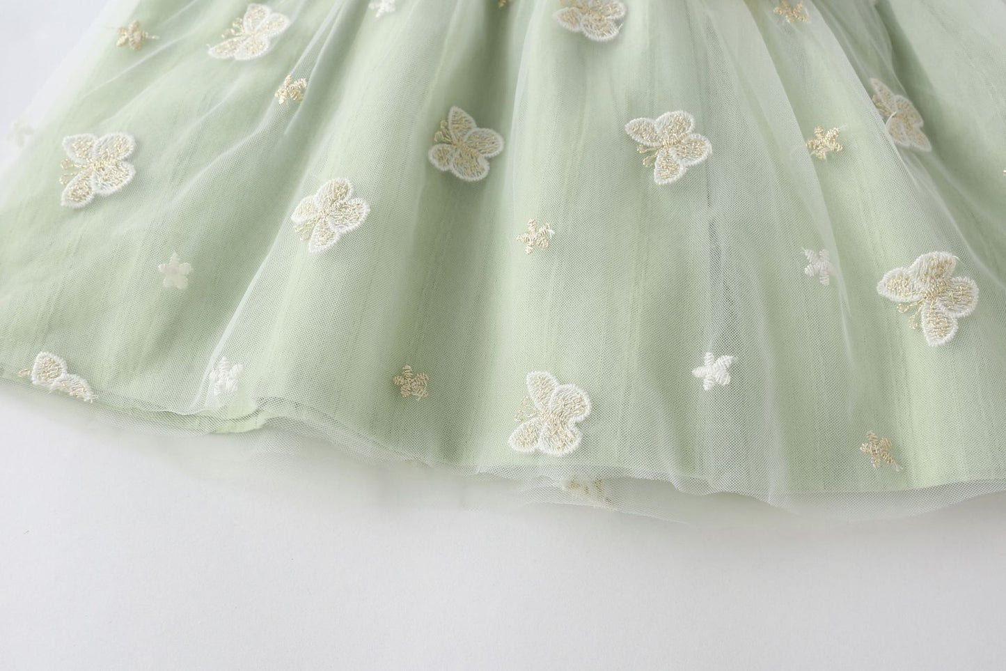 Vestido infantil con mariposas y lazo