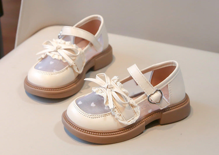 Zapatos de niña con lazo de amor