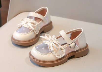 Zapatos de niña con lazo de amor