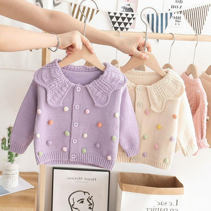 Cárdigan infantil con cuello de lunares