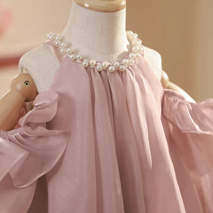 Vestido infantil abullonado con perlas
