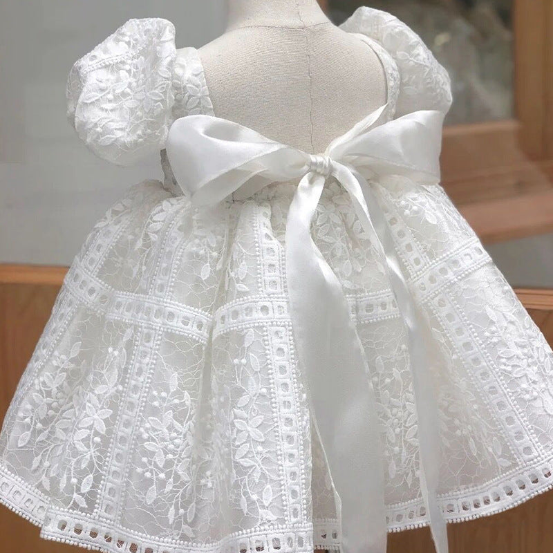Vestido infantil de encaje con lazo