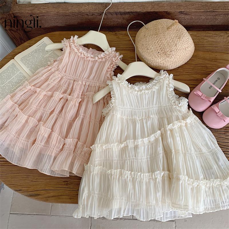Vestido de Tul con Volantes y Bolso