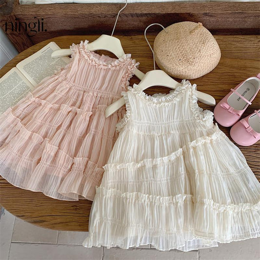 Vestido de Tul con Volantes y Bolso