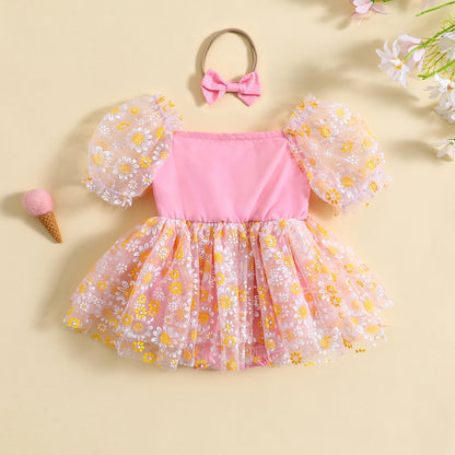 Vestido mameluco con estampado de margaritas y manga corta abullonada