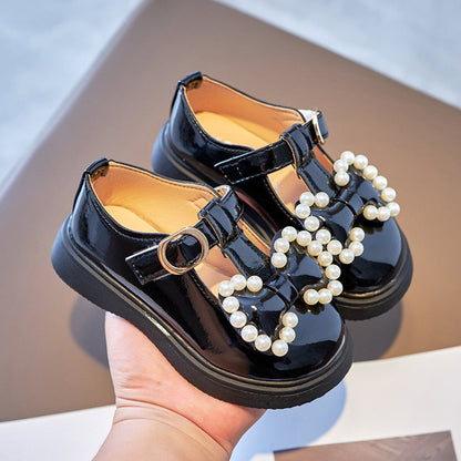 Zapatos de perlas con lazo