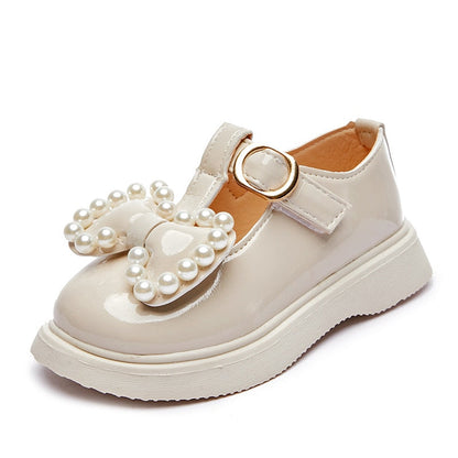 Zapatos de perlas con lazo