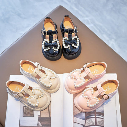 Zapatos de perlas con lazo