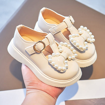 Zapatos de perlas con lazo