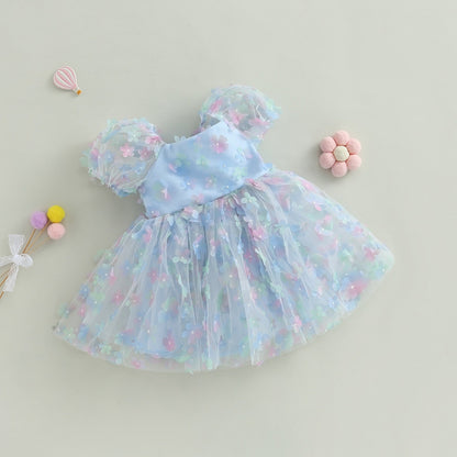 Vestido de tul con mangas abullonadas y flores