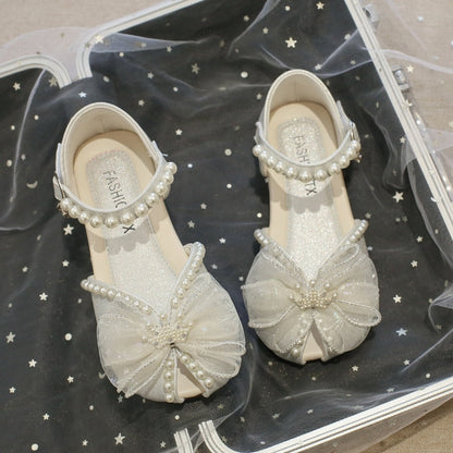Sandalias con lazo de perlas