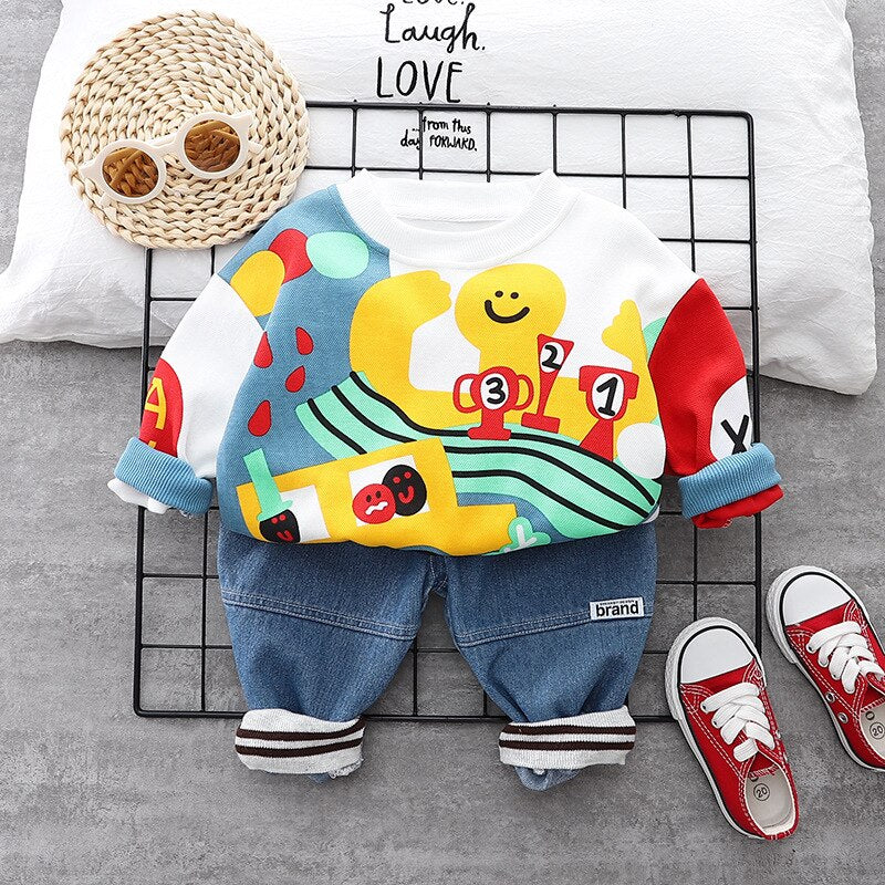 Conjunto de sudadera con jeans lavados con pulpo para niños de 2 piezas