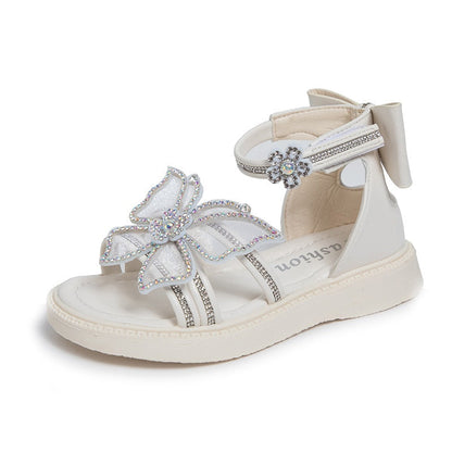 Sandalia de lujo con mariposa brillante