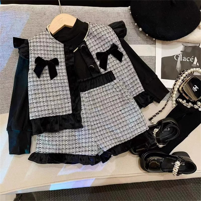Conjunto infantil a cuadros con lazo