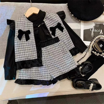 Conjunto infantil a cuadros con lazo