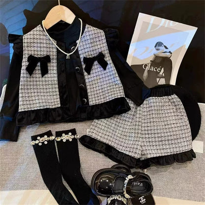 Conjunto infantil a cuadros con lazo